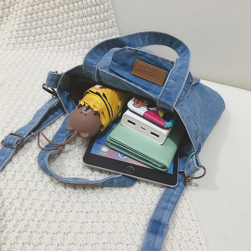 Bolso vaquero nueva textura de moda simple versión coreana de la tendencia de bolso de hombro único ligero y de gran capacidad bolso de cercanías en clase