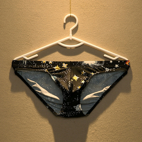 Men's stylish low-rise triangle underwear, ice silk breathable, fashionable, revealing, sexy, personalized, trendy, youth, plus size.