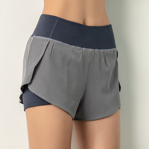 Foreign trade large size fake two-piece quick-drying shorts for girls running fitness pants pocket anti-exposure pants loose sports shorts