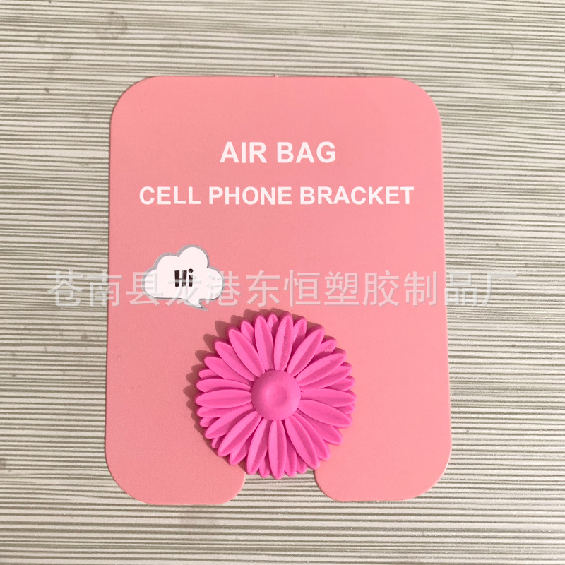 En stock al por mayor TikTok Cartoon creativo soporte de teléfono móvil puede soportar airbag soporte de teléfono móvil soporte de escritorio