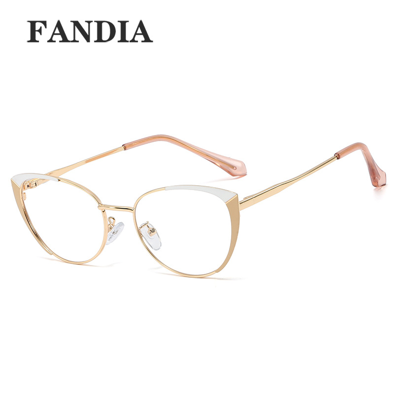 95608 nuevo metal de moda gafas lisas marco redondo de los hombres y las mujeres anti-azul gafas de luz artística de dos colores gafas de Marco