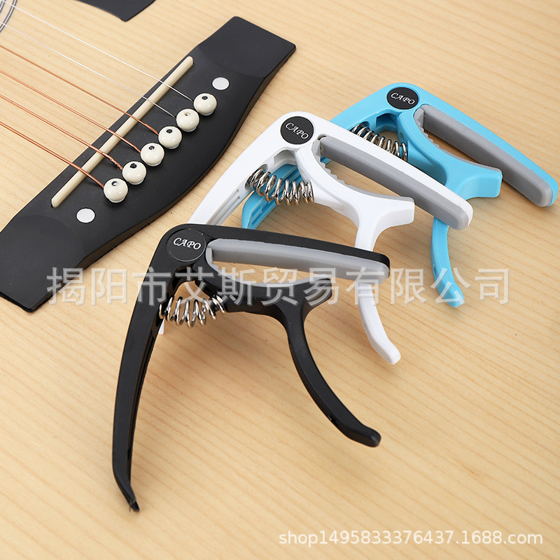 Capper de guitarra de plástico de acero resina folk Guitar Capper ukelele universal de doble uso Capper