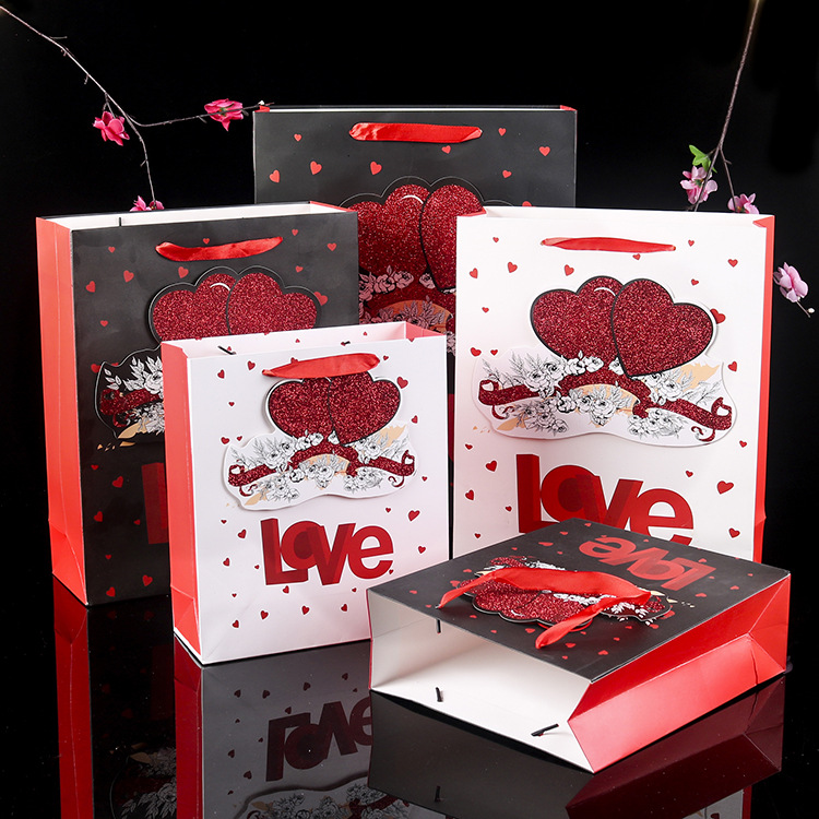 厂家现货金粉贴片立体婚庆伴手礼纸服装撒手玩具袋礼品袋生日袋