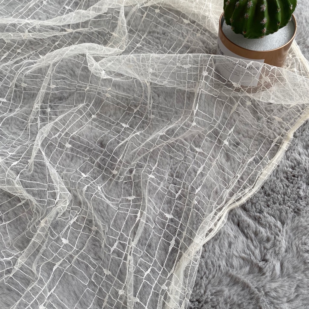 Suministro directo de fábrica de nylon no elástico de malla tela jacquard geométrico gancho de malla base de tela ropa para niños tela en stock multicolor