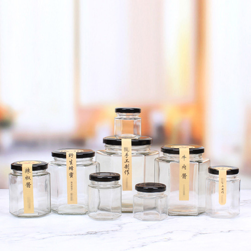 Bulk hexagonal honey jars, hexagonal pickled vegetable jars, glass chili sauce jars, fruit jam canned jars, transparent packaging sealed cans
