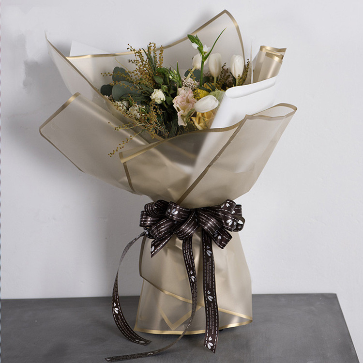 Flower Party Factory al por mayor papel de embalaje de flores impermeable explosivo papel mate borde mágico ramo de papel papel papel de flores papel de embalaje