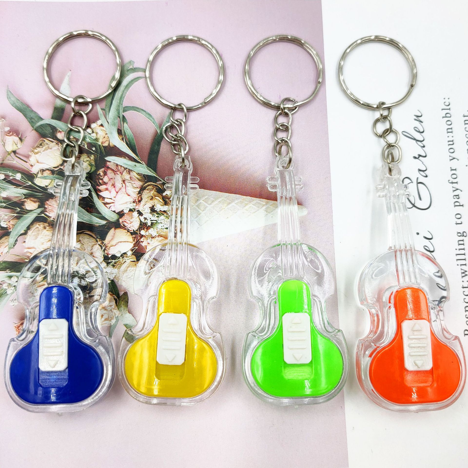 Comercio exterior transfronterizo creativo luminoso violín llavero colgante bolsa de Ropa Accesorios de juguete luminoso logo