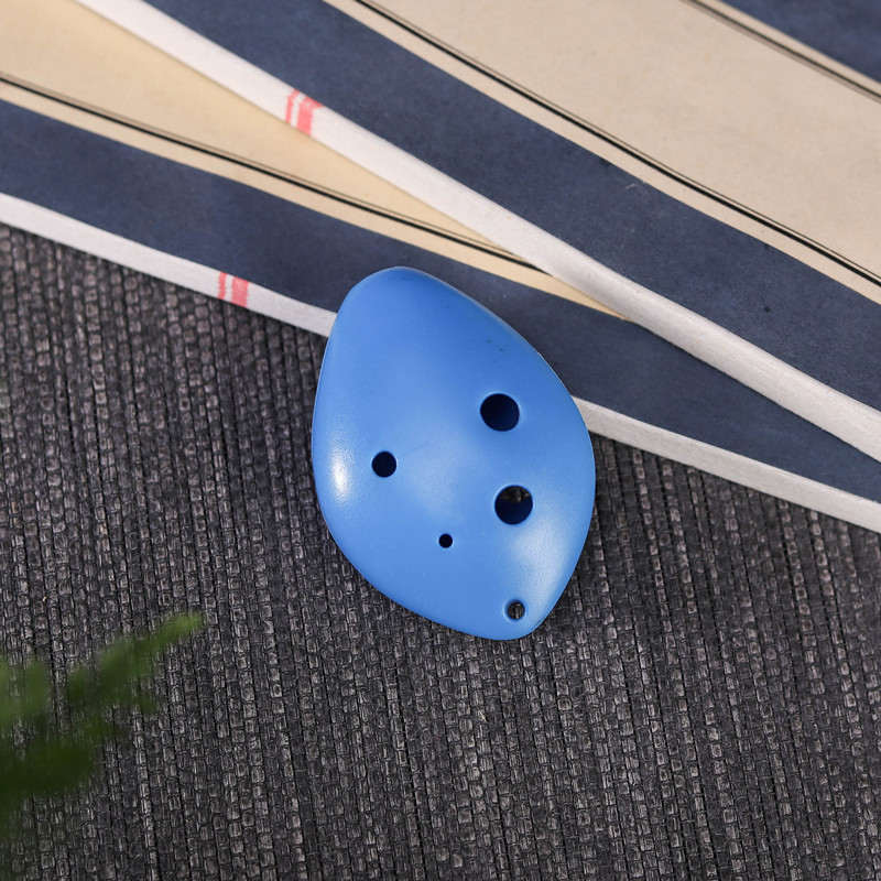 Ocarina 6 agujeros de seis agujeros de plástico agudos C-tono Ocarina SC-tono de plástico Ocarina al por mayor con cordón