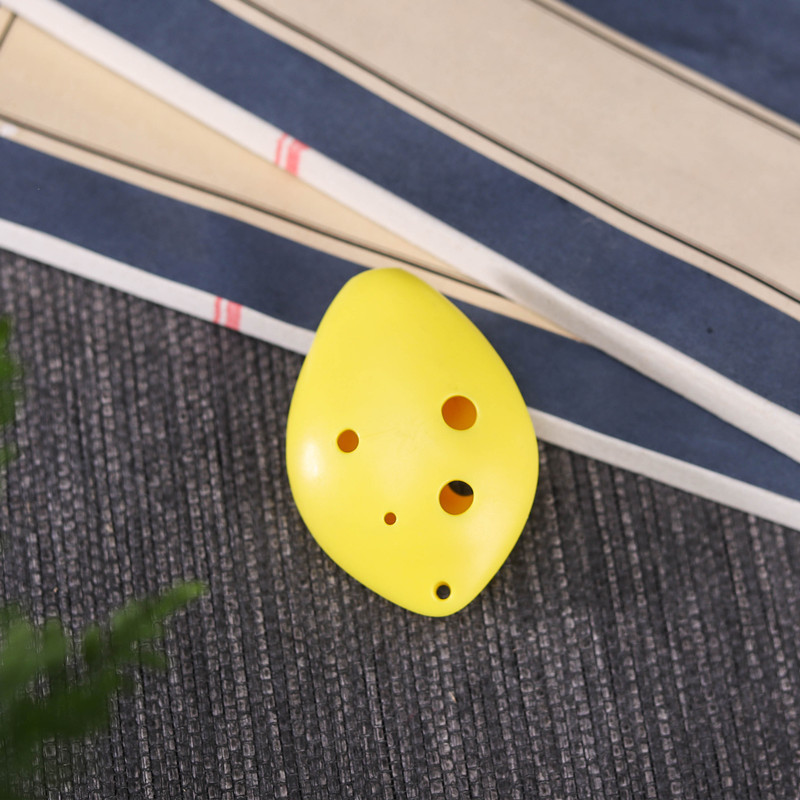 Ocarina 6 agujeros de seis agujeros de plástico agudos C-tono Ocarina SC-tono de plástico Ocarina al por mayor con cordón