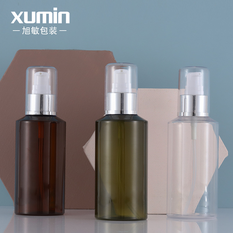 En stock al por mayor PET plástico loción prensa botella plata brillante cubierta completa bomba cabeza cosméticos sub-botella Xumin material de embalaje image 1