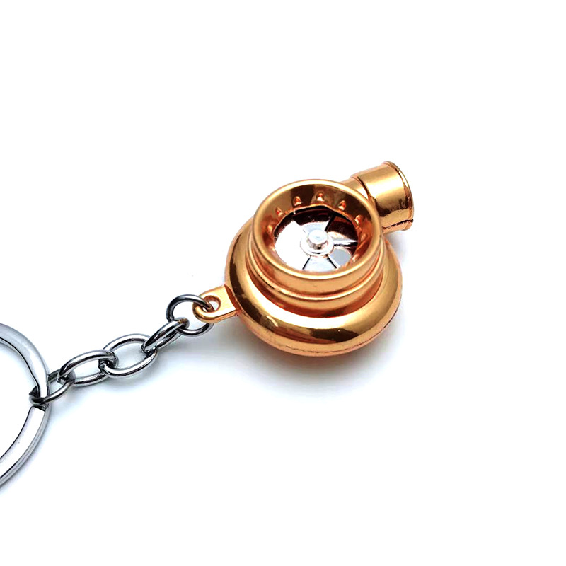 Transfronterizo caliente coche turbina llavero metal creativo de alta gama luminoso LED turbina coche llavero colgante