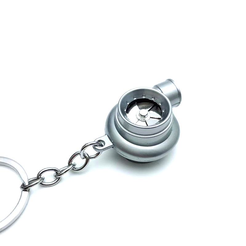 Transfronterizo caliente coche turbina llavero metal creativo de alta gama luminoso LED turbina coche llavero colgante