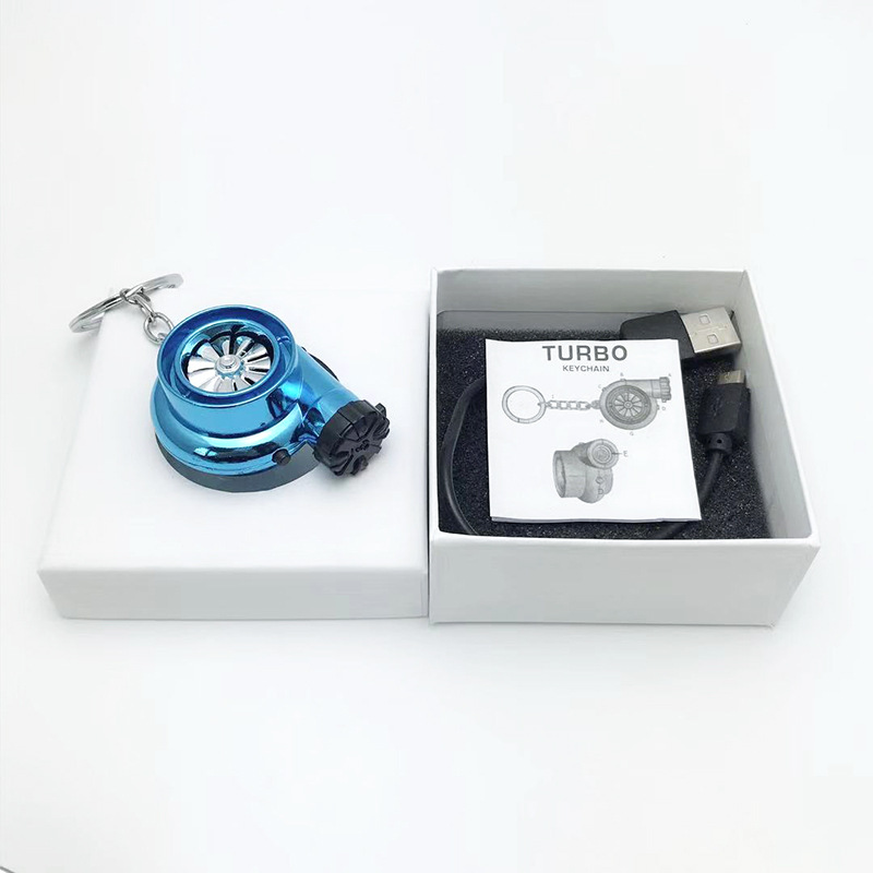 Transfronterizo creativo coche turbina encendedor de cigarrillos llavero de negocios de carga USB de metal más ligero llave del coche colgante