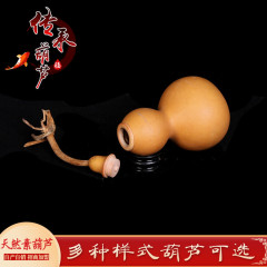 梨の木を彫って口を開けたヒョウタンの口を開けたヒョウタンの置物