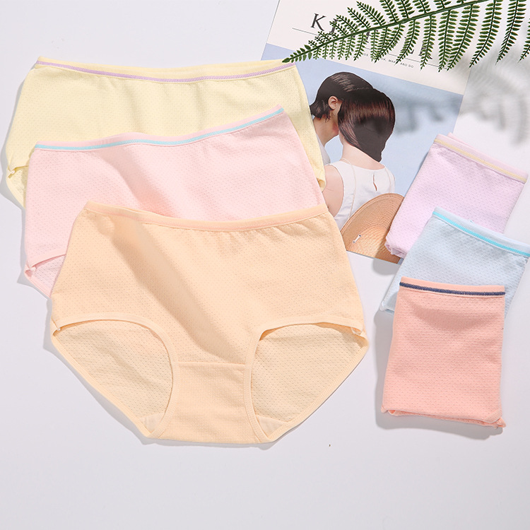 Ropa interior de niña japonesa simple color sólido ropa interior de algodón transpirable calzoncillos de algodón de cintura media para mujer al por mayor