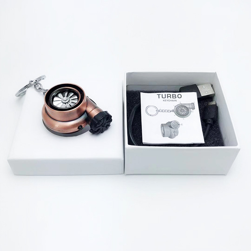 Transfronterizo creativo coche turbina encendedor de cigarrillos llavero de negocios de carga USB de metal más ligero llave del coche colgante