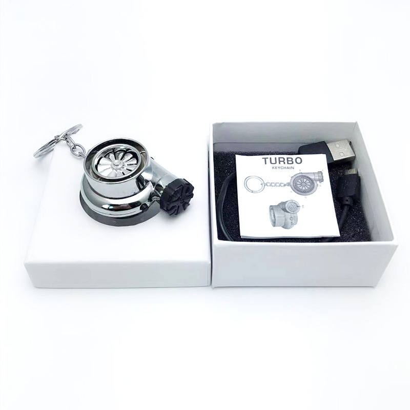 Transfronterizo creativo coche turbina encendedor de cigarrillos llavero de negocios de carga USB de metal más ligero llave del coche colgante