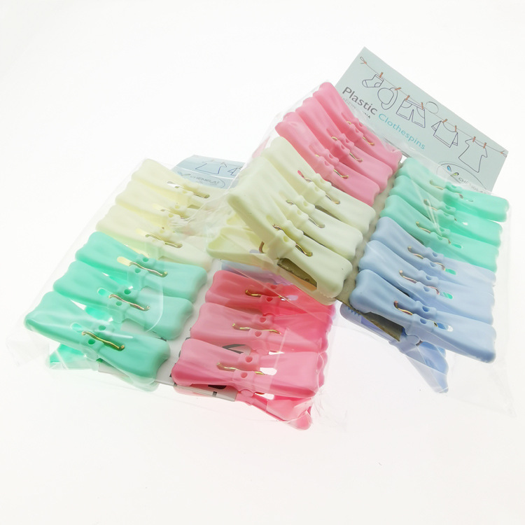 N2 013 133 # doce bowknot clip de ropa edredón de plástico clip de secado edredón clip Yiwu 2 yuanes dos yuanes Tienda de Departamentos