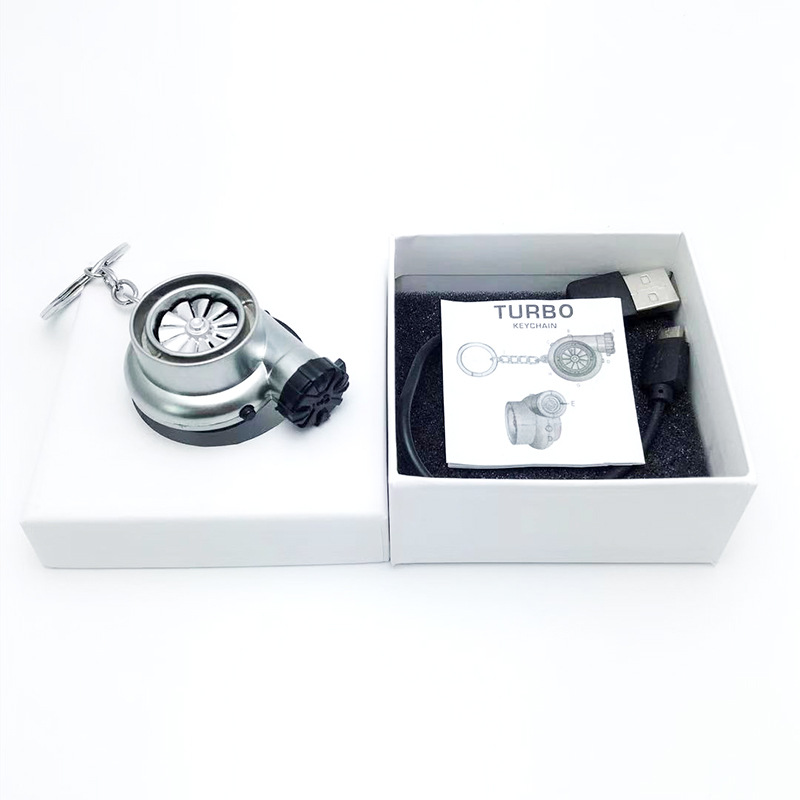 Transfronterizo creativo coche turbina encendedor de cigarrillos llavero de negocios de carga USB de metal más ligero llave del coche colgante