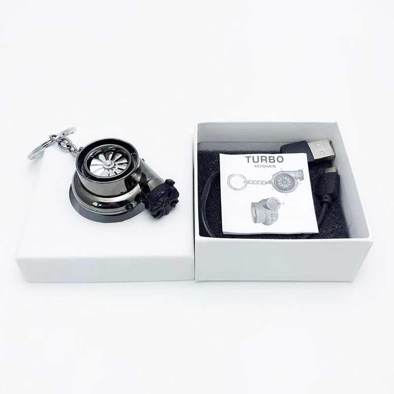 Transfronterizo creativo coche turbina encendedor de cigarrillos llavero de negocios de carga USB de metal más ligero llave del coche colgante