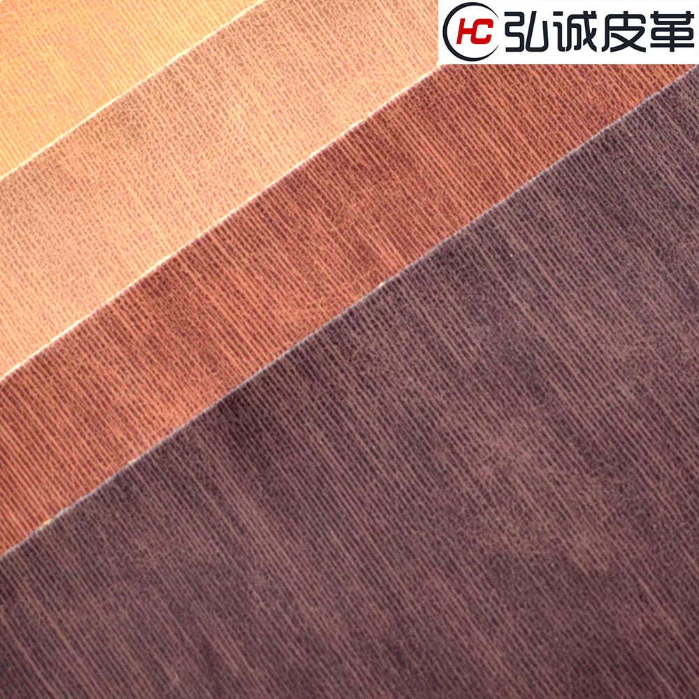 PU人造革同底同色条纹羊巴手袋革箱包女包软包电脑包皮革现货批发