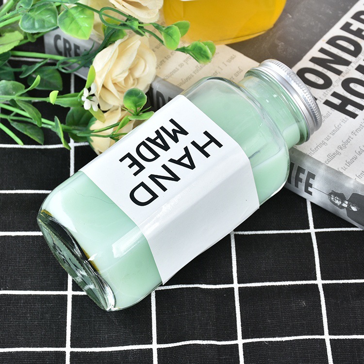 Fábrica al por mayor nueva cubierta de aluminio cuadrada para llevar botella de bebida octogonal leche té café botella sellada botella de vidrio de jugo