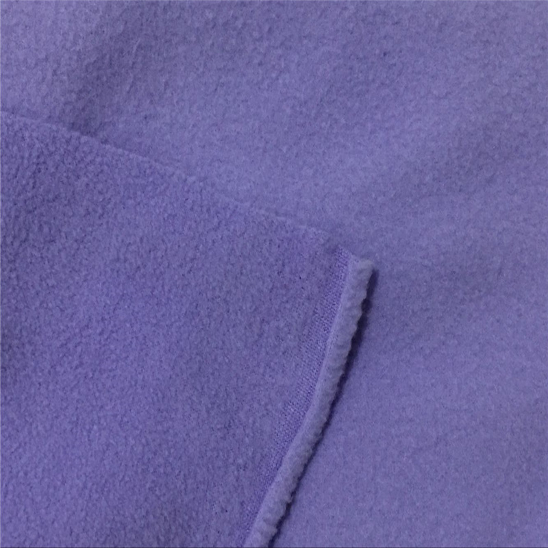 Tejido de lana polar de un solo lado tejido de lana compuesto de doble cara textil para el hogar cálido tejido de ropa para niños polar