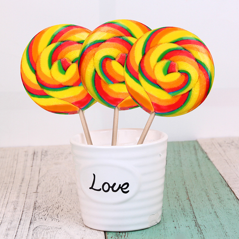 Golden rice 50g colorful wave candy kung fu candy fruit flavor lollipop children's casual snacks wholesale