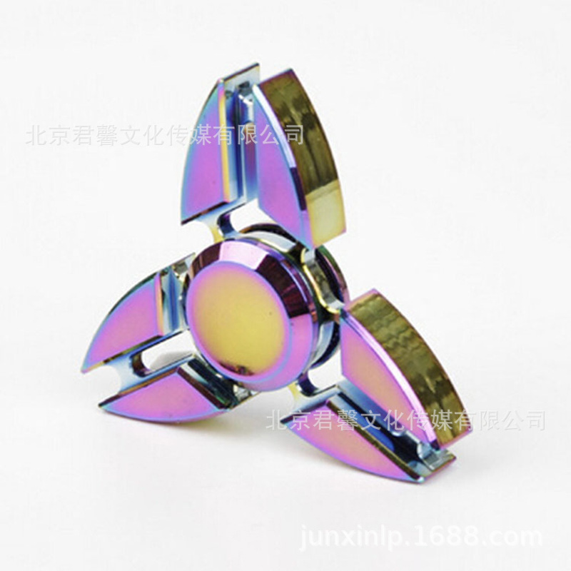 B Dedos de araña de colores, peonza, yema del dedo de metal de tres hojas, peonza de dos hojas, productos pequeños, suministro al por mayor