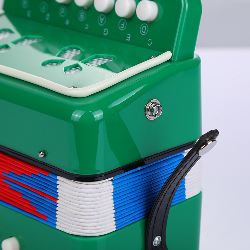 Acordeón infantil de 7 teclas para principiantes, instrumento musical occidental para la educación temprana, juguete musical multicolor en caja.