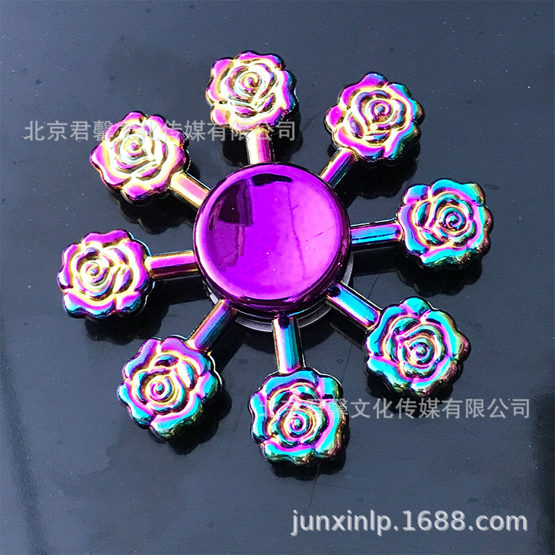 B Dedos de araña de colores, peonza, yema del dedo de metal de tres hojas, peonza de dos hojas, productos pequeños, suministro al por mayor