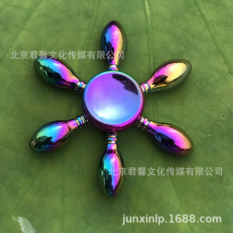 B Dedos de araña de colores, peonza, yema del dedo de metal de tres hojas, peonza de dos hojas, productos pequeños, suministro al por mayor