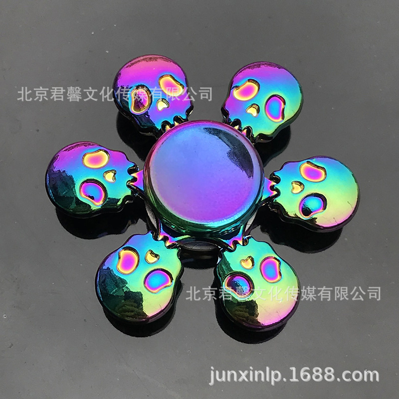 B Dedos de araña de colores, peonza, yema del dedo de metal de tres hojas, peonza de dos hojas, productos pequeños, suministro al por mayor