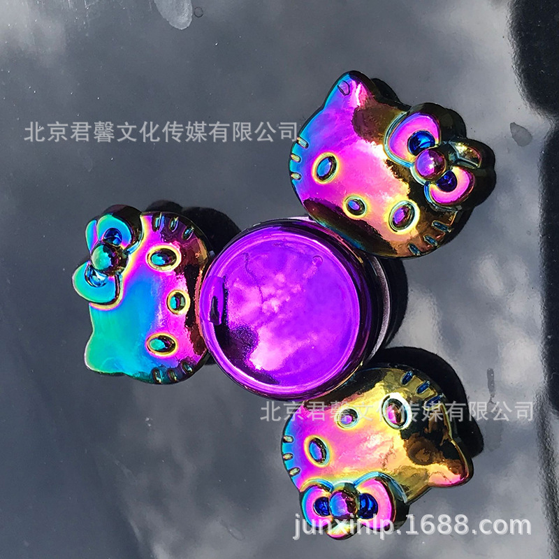 B Dedos de araña de colores, peonza, yema del dedo de metal de tres hojas, peonza de dos hojas, productos pequeños, suministro al por mayor
