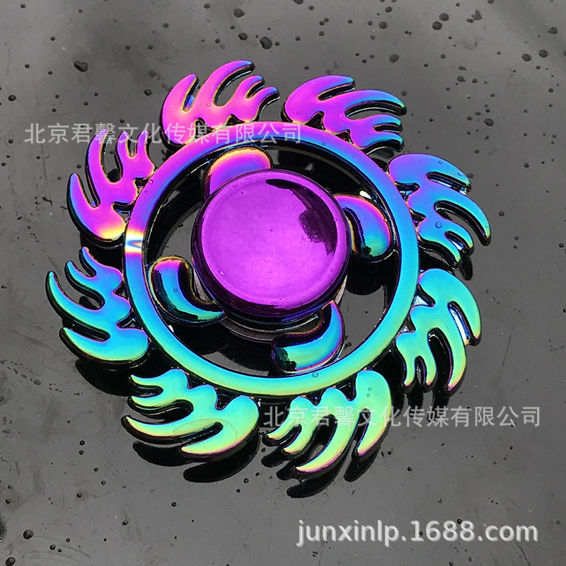 B Dedos de araña de colores, peonza, yema del dedo de metal de tres hojas, peonza de dos hojas, productos pequeños, suministro al por mayor