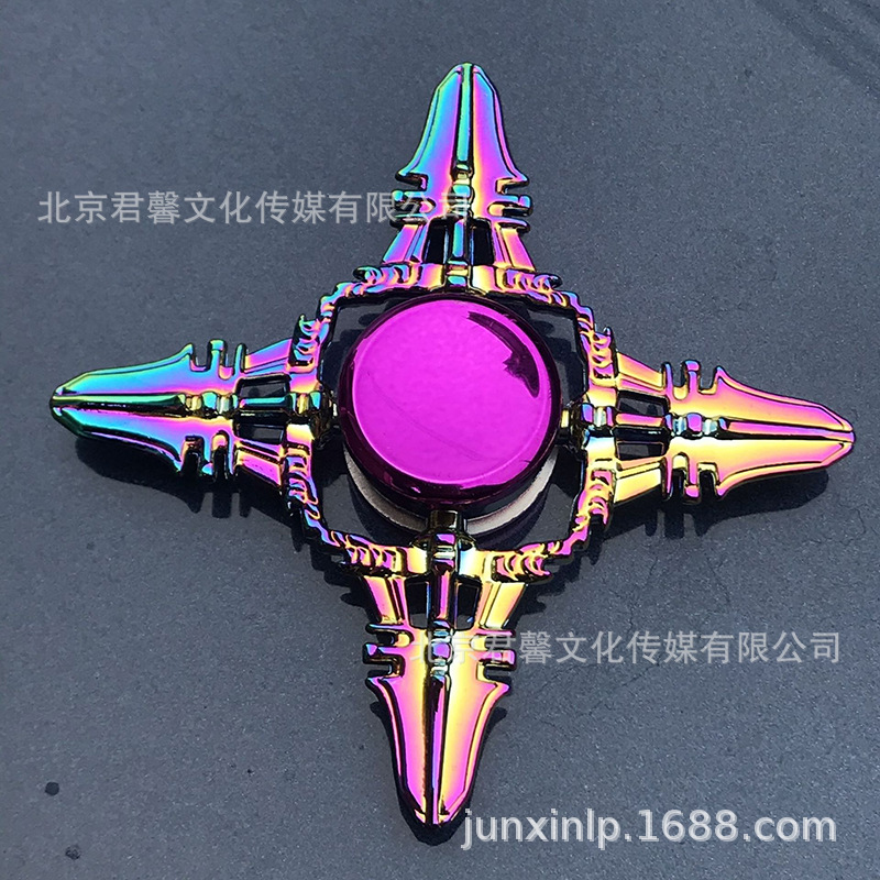 B Dedos de araña de colores, peonza, yema del dedo de metal de tres hojas, peonza de dos hojas, productos pequeños, suministro al por mayor