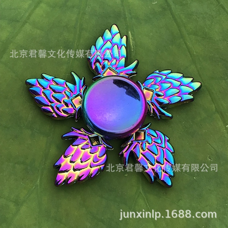 B Dedos de araña de colores, peonza, yema del dedo de metal de tres hojas, peonza de dos hojas, productos pequeños, suministro al por mayor