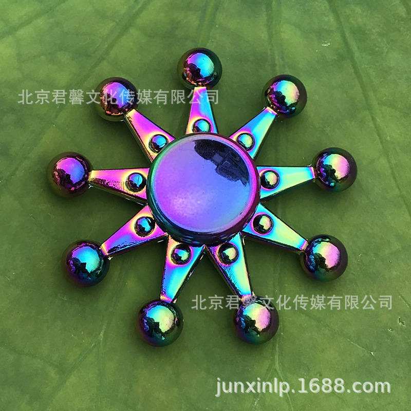 B Dedos de araña de colores, peonza, yema del dedo de metal de tres hojas, peonza de dos hojas, productos pequeños, suministro al por mayor
