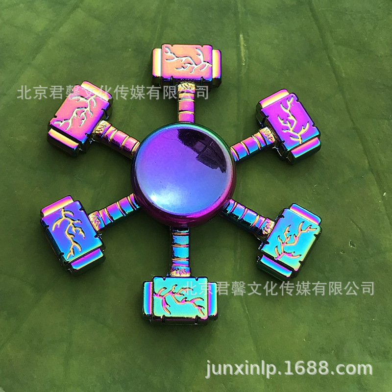 B Dedos de araña de colores, peonza, yema del dedo de metal de tres hojas, peonza de dos hojas, productos pequeños, suministro al por mayor