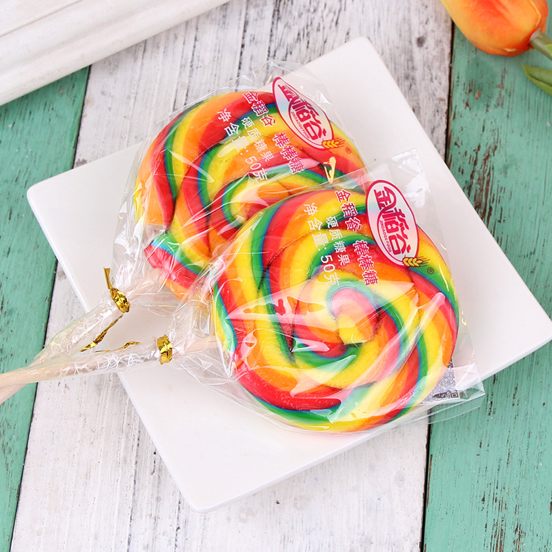Golden rice 50g colorful wave candy kung fu candy fruit flavor lollipop children's casual snacks wholesale