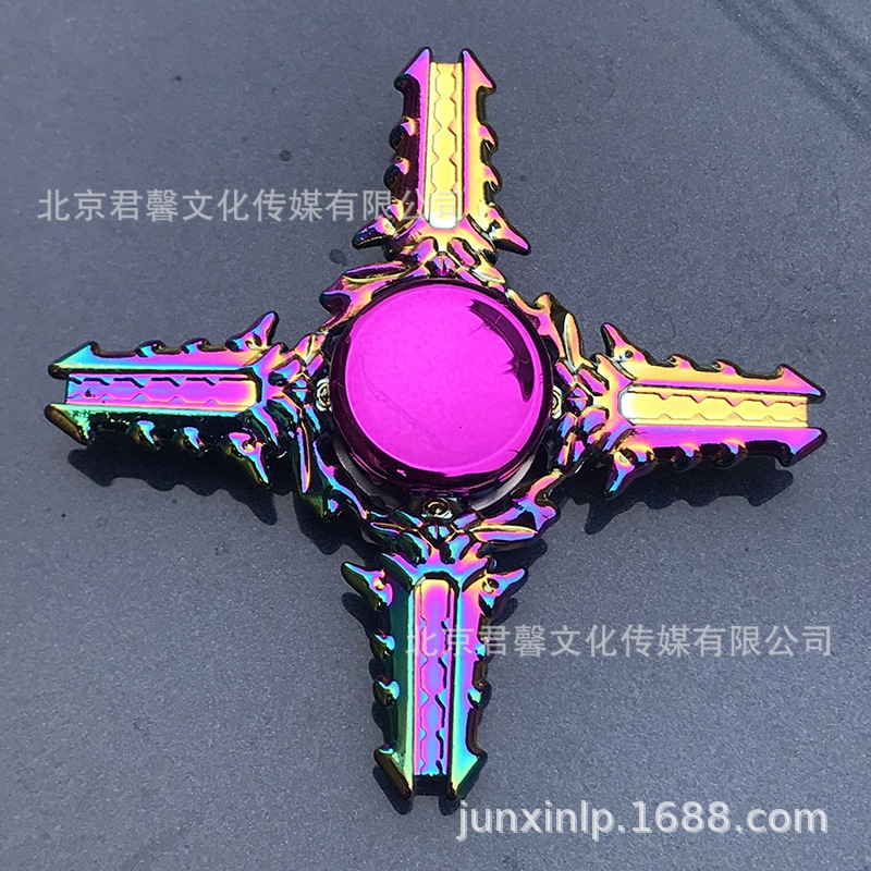 B Dedos de araña de colores, peonza, yema del dedo de metal de tres hojas, peonza de dos hojas, productos pequeños, suministro al por mayor