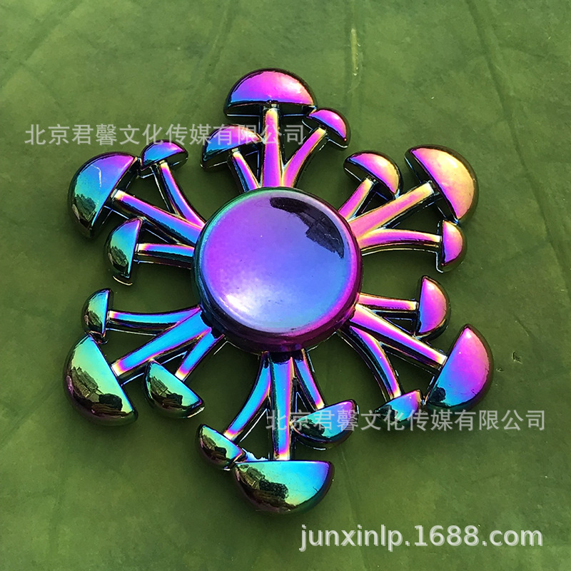B Dedos de araña de colores, peonza, yema del dedo de metal de tres hojas, peonza de dos hojas, productos pequeños, suministro al por mayor
