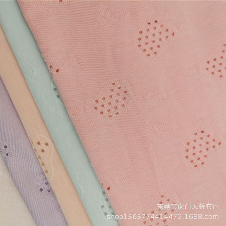 春夏新款现货针织TR时尚镂空网眼提花面料手感柔软，时尚女装提花