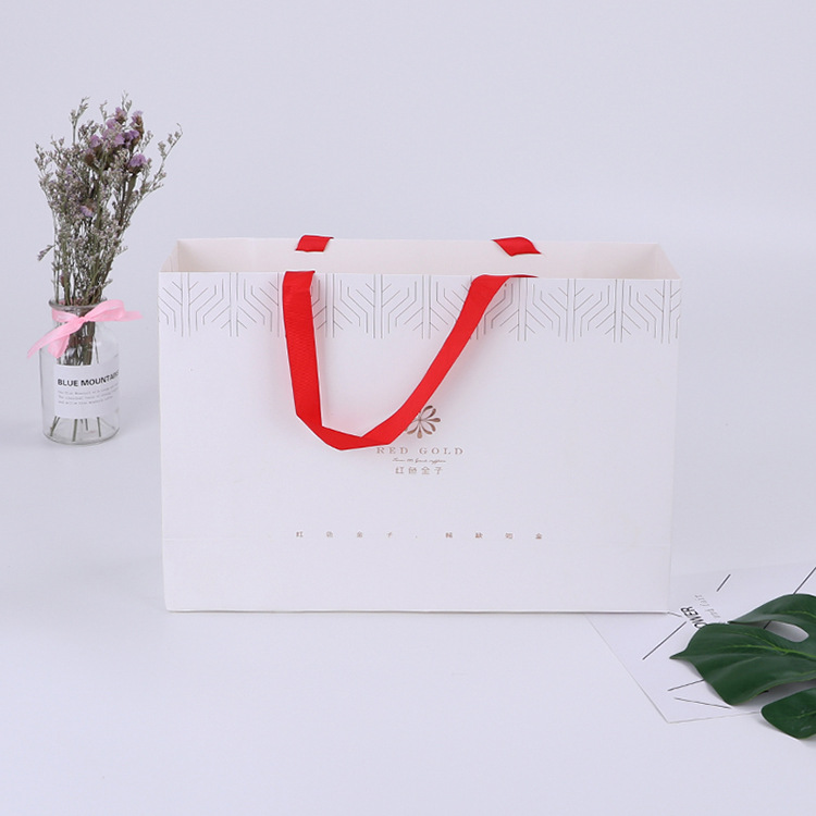 厂家现货批发手提纸袋 广告服装购物礼品手提袋手提牛皮纸袋定 制