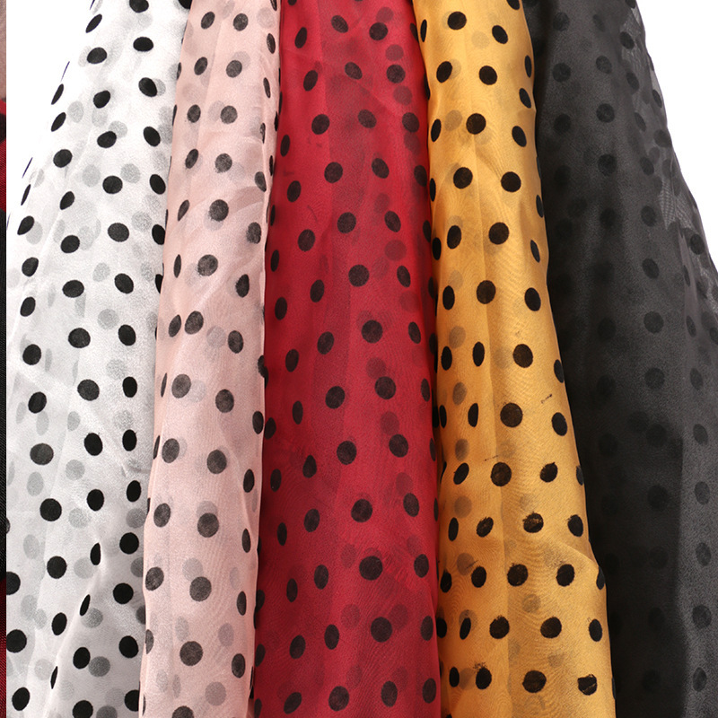 Manufacturers supply bright yarn organza flocking polka dot women's skirt yarn sleeve clothing fabric accessories