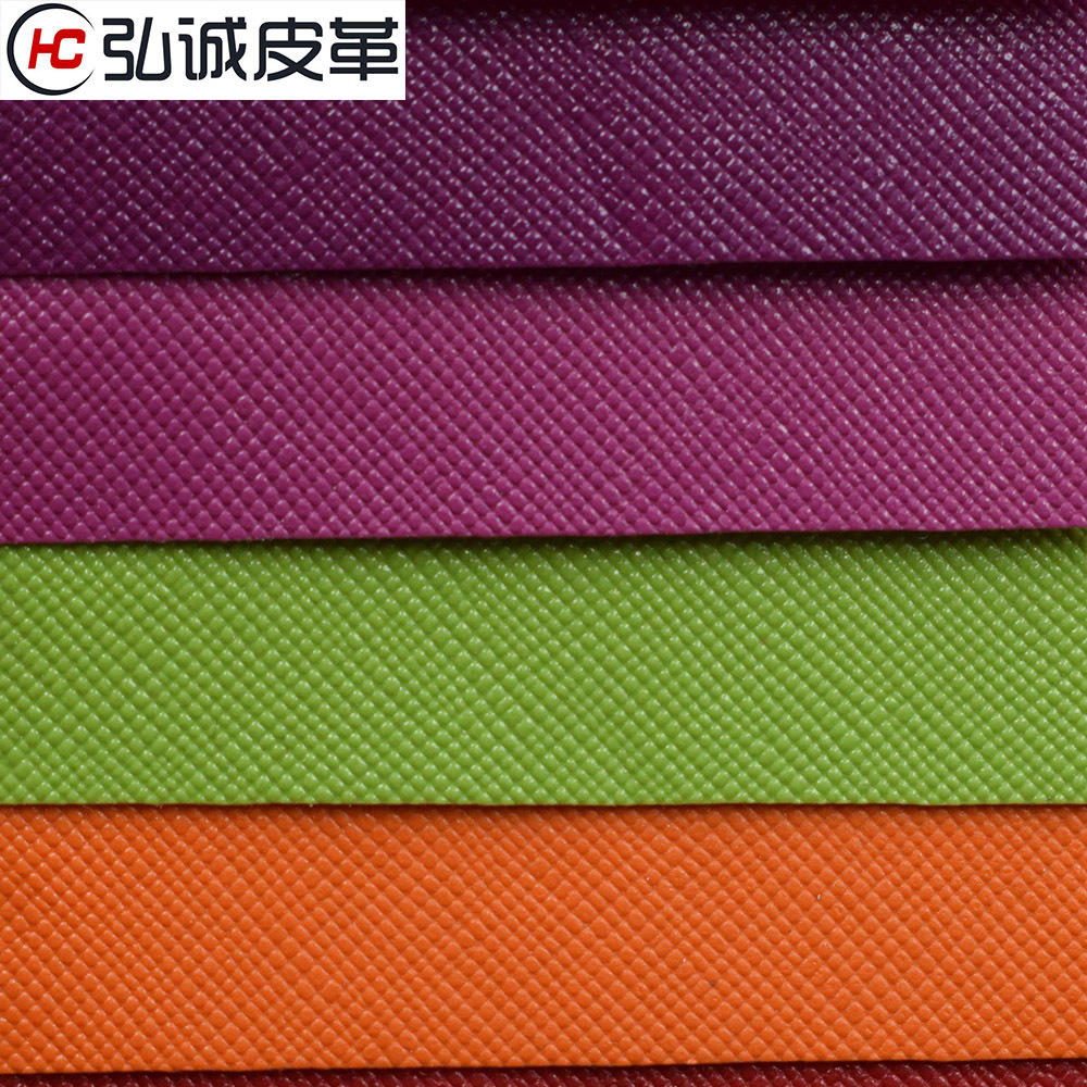 0.5水刺底十字纹PVC人造革手袋箱包革包装工艺品面料工厂现货批发