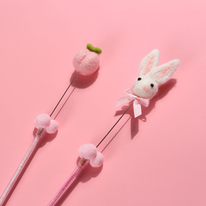 Juguete para gatos de fieltro de lana estilo japonés con diseño de gato rosa, con sonido, para gatitos, ideal para comercio transfronterizo en Amazon.
