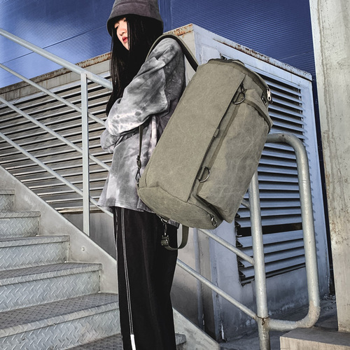 Fashionable men's bag, large capacity travel backpack, men's outdoor travel sports cylinder backpack, trendy canvas school bag