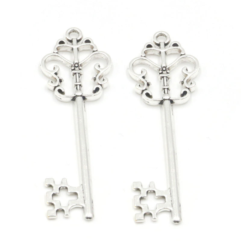 DIY aleación collar Accesorios Estilo Europeo hueco exquisito tallado accesorios clave suéter cadena colgante