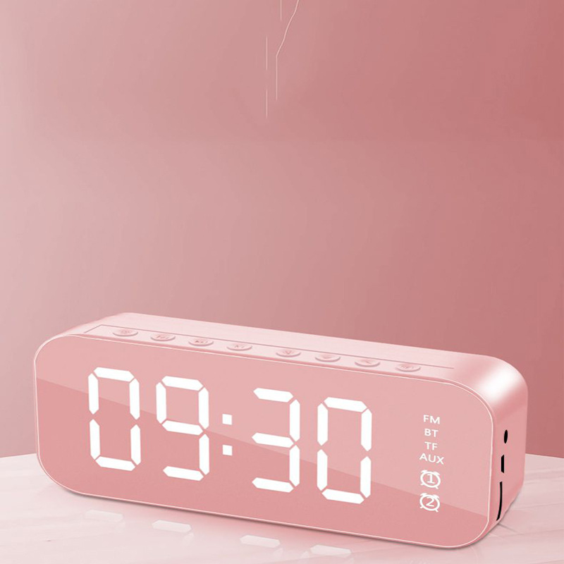Nuevo reloj despertador Bluetooth audio inalámbrico Tarjeta de radio escritorio mini pequeña pistola acero altavoz espejo teléfono móvil altavoz
